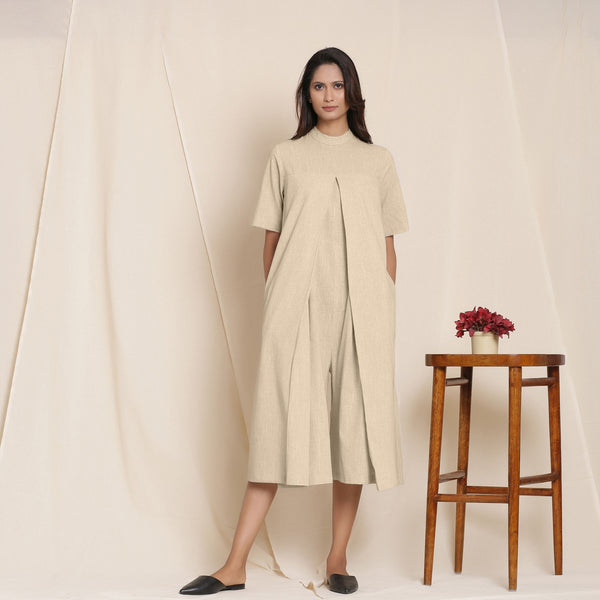 Front View of a Model wearing Cotton Beige Box Pleated Jumpsuit