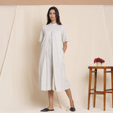 Front View of a Model wearing Cotton Cloudy Grey Box Pleated Jumpsuit