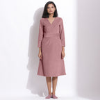 Front View of a Model wearing Cotton Corduroy Mauve Surplice Dress