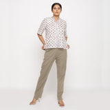 Front View of a Model wearing Cotton Flax Mid-Rise Beige Tapered Pant