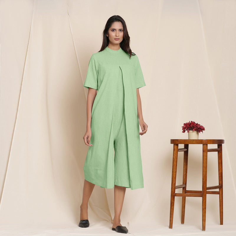 Right View of a Model wearing Cotton Green Box Pleated Jumpsuit