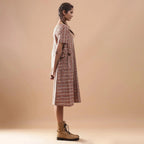 Right View of a Model wearing Kalamkari Chevron Striped Paneled Dress