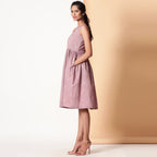 Left View of a Model wearing Light Maroon Yarn Dyed Cotton V-Neck Yoked Midi Dress