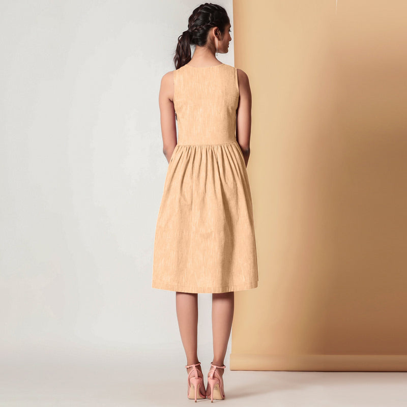 Back View of a Model wearing Cotton Peach Mellow Gathered Yoke Dress