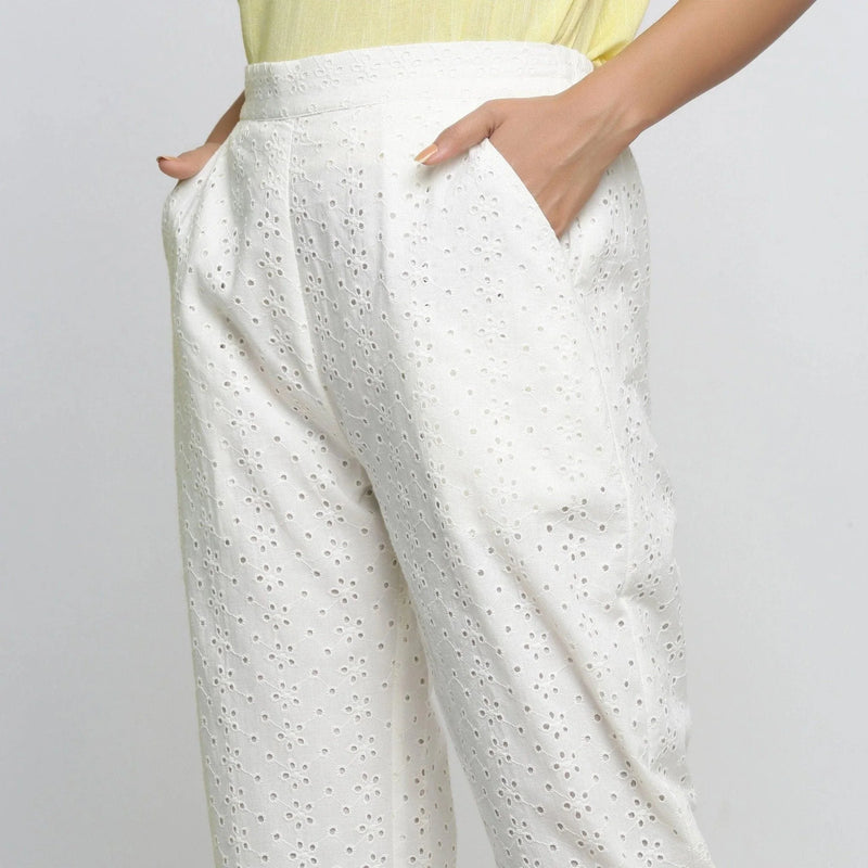 Left View of a Model wearing Cotton Schiffli White Straight Pant