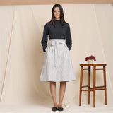 Front View of a Model wearing Grey 100% Cotton Striped High-Rise Paperbag Skirt