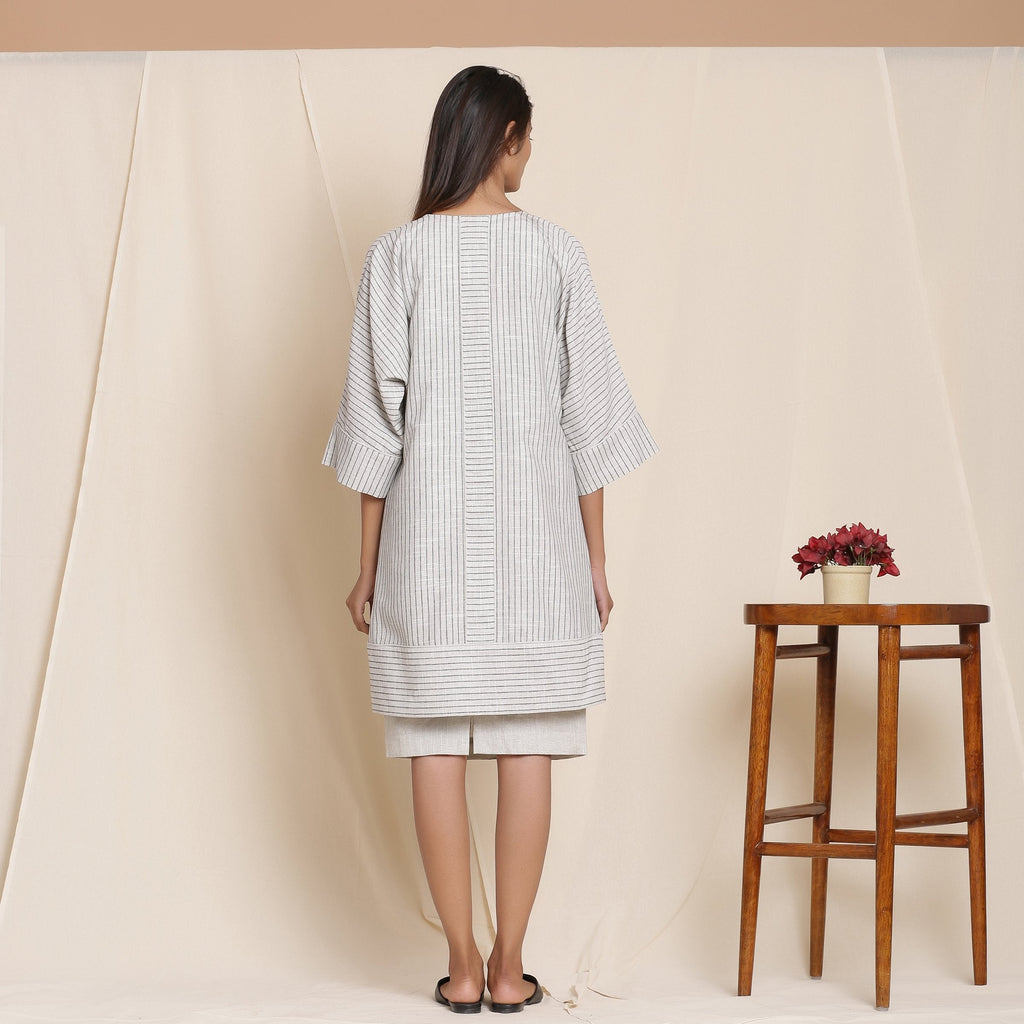 Back View of a Model wearing Grey Striped Cotton Front Open Paneled Overlay