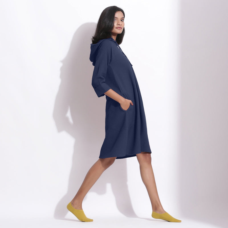 Right View of a Model wearing Cotton Waffle Navy Blue Hoodie Dress