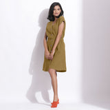 Left View of a Model wearing Cotton Waffle Olive Green Button-Down Dress