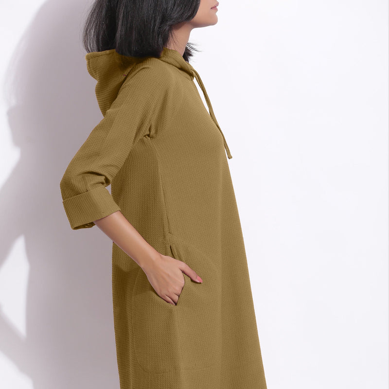 Right Detail of a Model wearing Cotton Waffle Olive Green Hoodie Dress