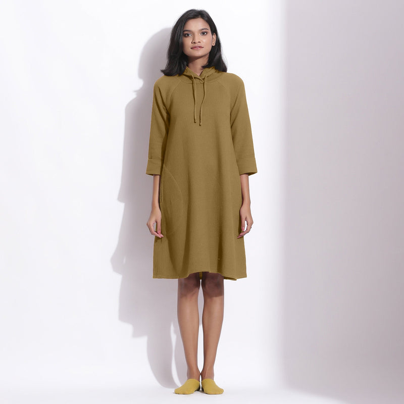 Front View of a Model wearing Cotton Waffle Olive Green Hoodie Dress