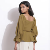 Back View of a Model wearing Cotton Waffle Olive Green Peplum Top