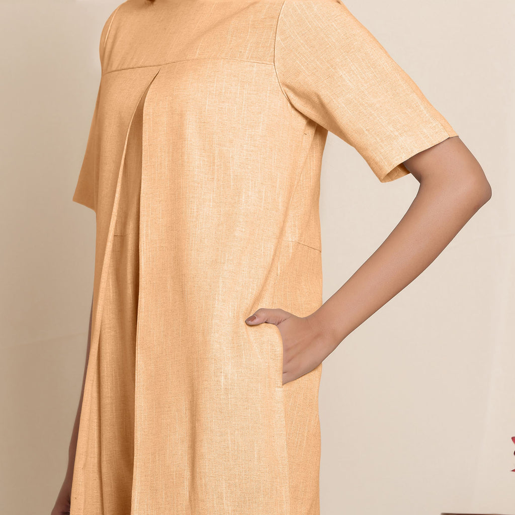 Front Detail of a Model wearing Yellow Cotton High Neck Pleated Midi Jumpsuit