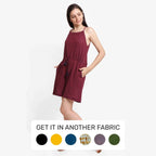 Left View of a Model wearing Crimson Polka Dot Halter Neck Romper
