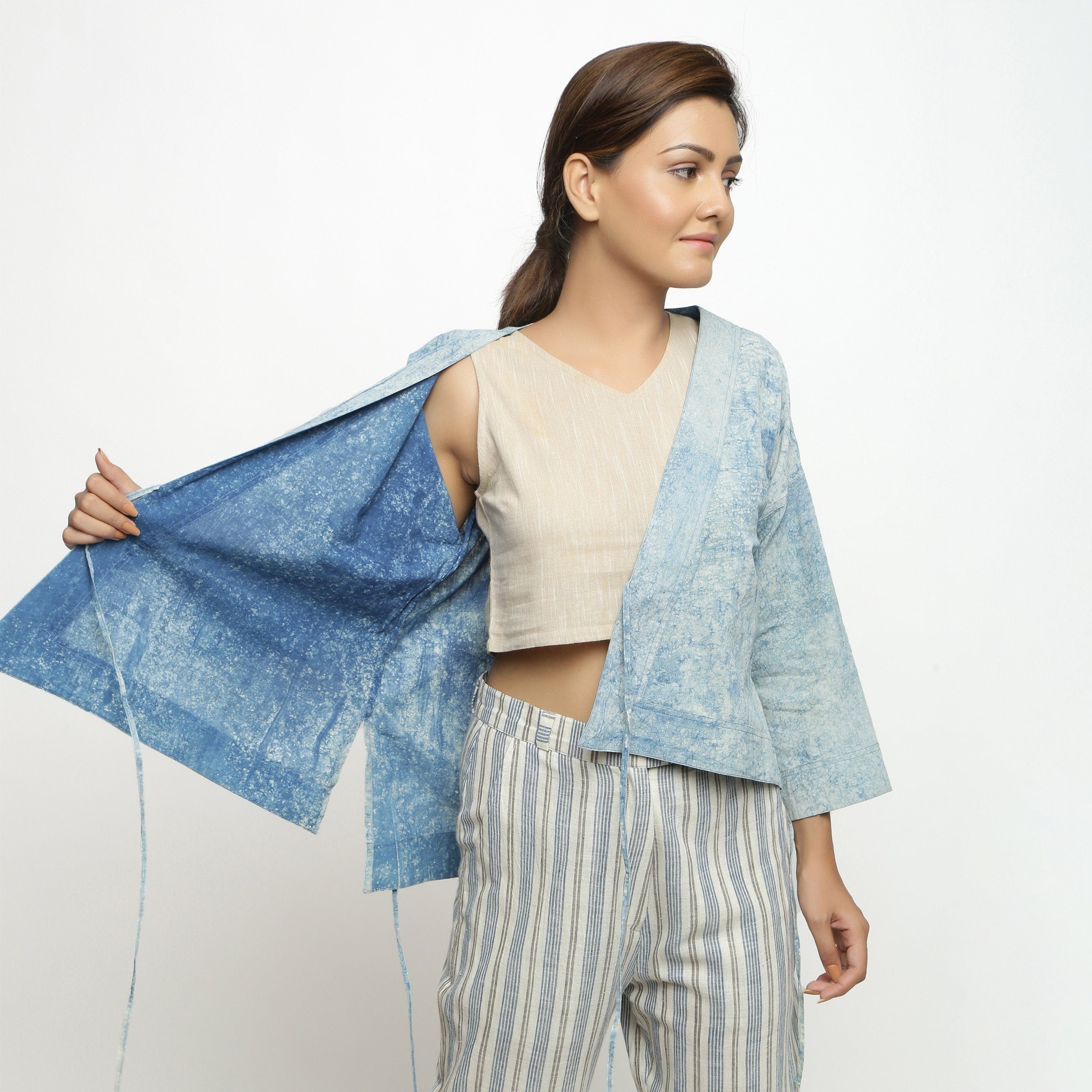 Front View of a Model wearing Dabu Hand-Lep Cotton High Low Outerwear