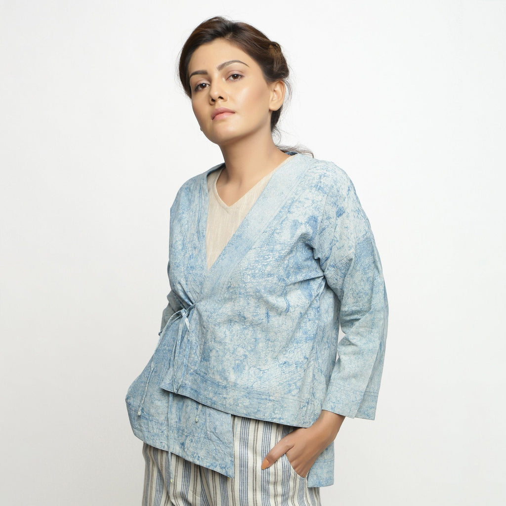 Left View of a Model wearing Dabu Hand-Lep Cotton High Low Outerwear