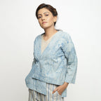 Left View of a Model wearing Dabu Hand-Lep Cotton High Low Outerwear