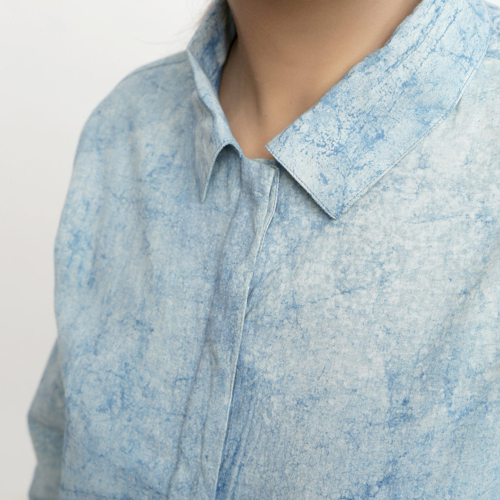 Front Detail of a Model wearing Blue Dabu Printed Natural Dyed Cotton Button-Down Top