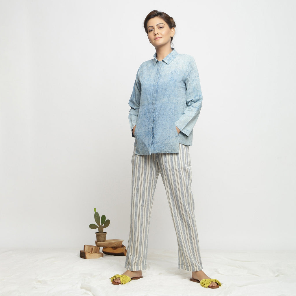 Front View of a Model wearing Blue Dabu Printed Natural Dyed Cotton Button-Down Top