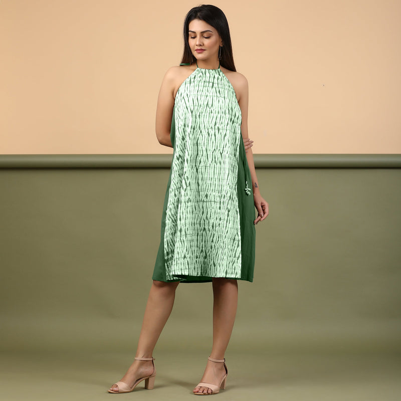 Front View of a Model wearing Dark Green Green Shibori Halter Neck A line Dress