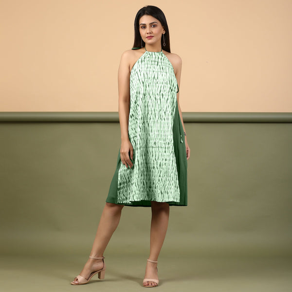 Front View of a Model wearing Dark Green Green Shibori Halter Neck A line Dress