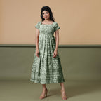 Front View of a Model wearing Dark Green Shibori Elasticated Gathered Dress