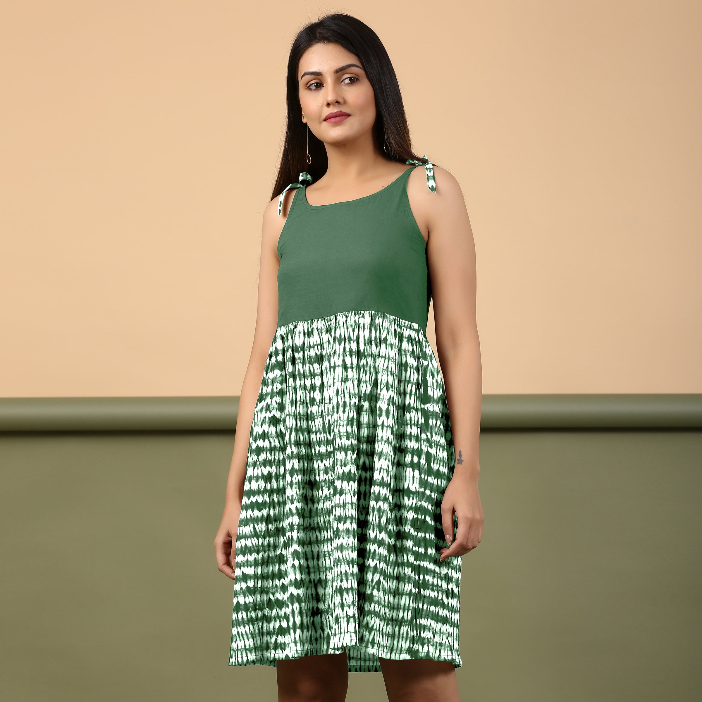 Front View of a Model wearing Dark Green Shibori Gathered Short Dress