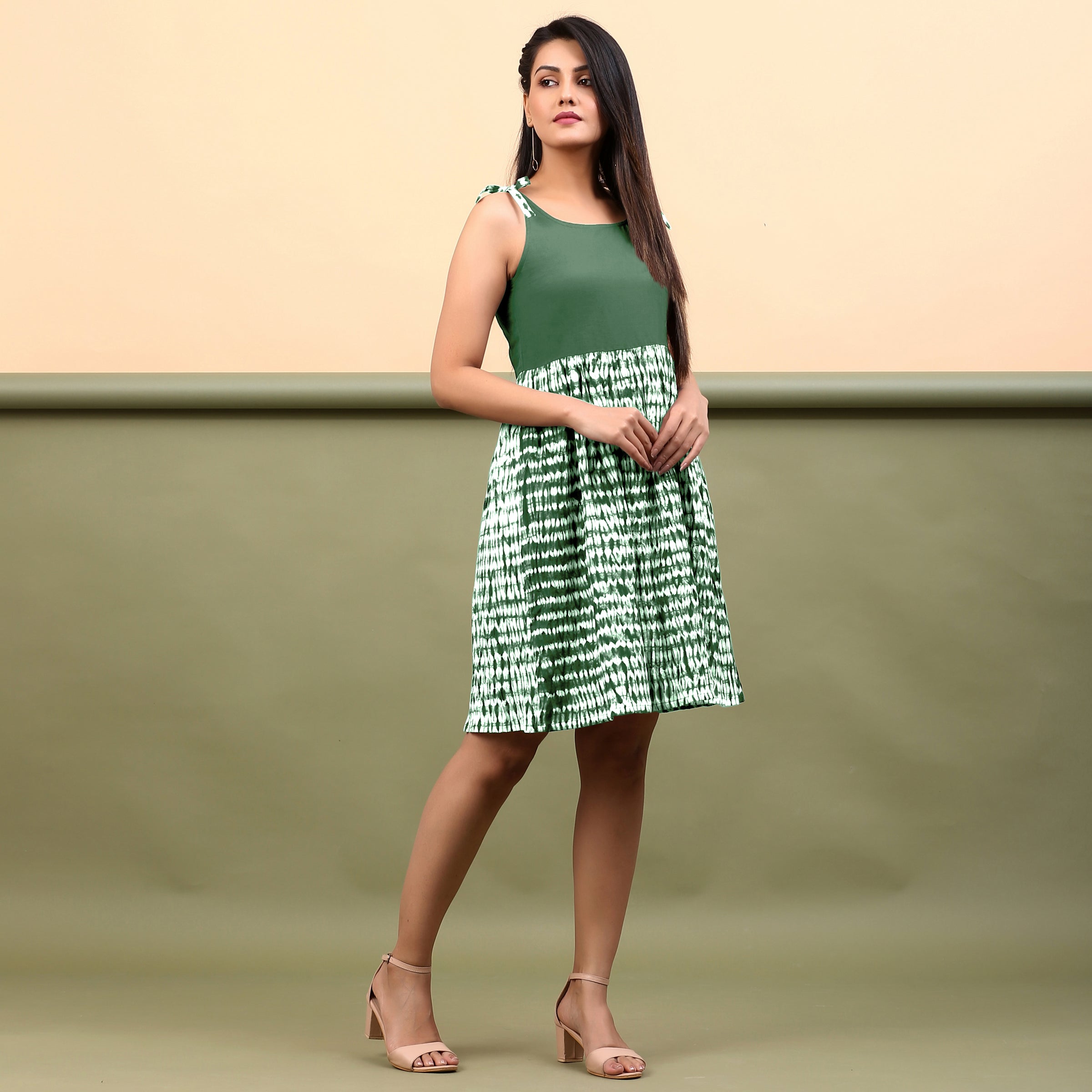 Right View of a Model wearing Dark Green Shibori Gathered Short Dress