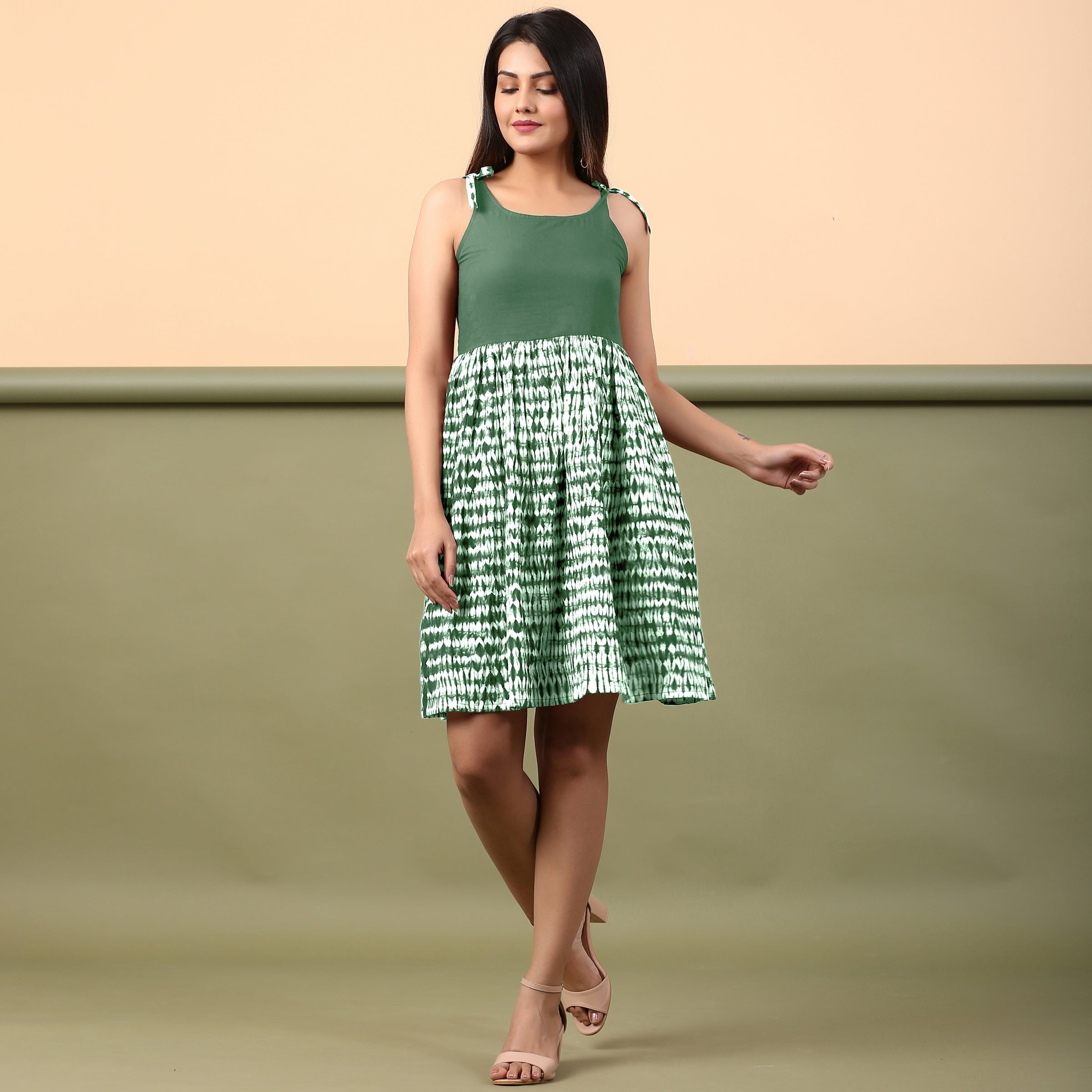 Front View of a Model wearing Dark Green Shibori Gathered Short Dress