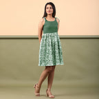 Front View of a Model wearing Dark Green Shibori Gathered Short Dress