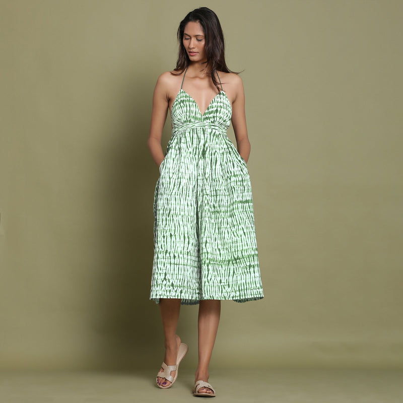 Front View of a Model wearing Dark Green Shibori Halter Neck Gathered Dress