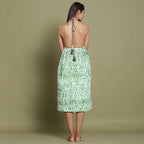 Back View of a Model wearing Dark Green Shibori Halter Neck Gathered Dress