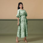 Right View of a Model wearing Dark Green Shibori Kaftan Dress