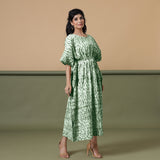 Right View of a Model wearing Dark Green Shibori Kaftan Dress