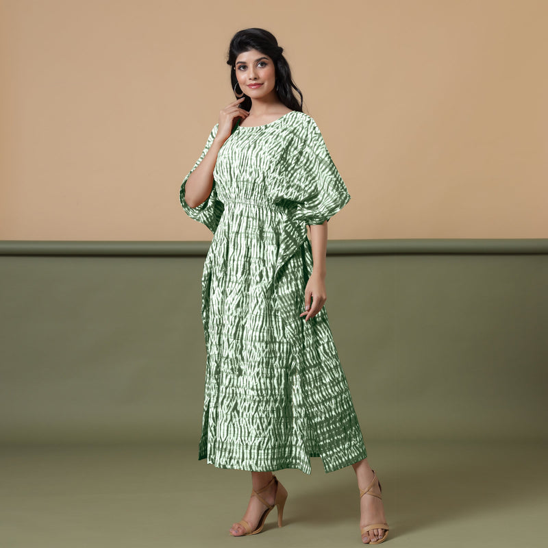 Left View of a Model wearing Dark Green Shibori Kaftan Dress