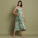 Right View of a Model wearing Dark Green Shibori One-Shoulder Midi Dress
