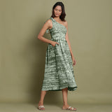 Right View of a Model wearing Dark Green Shibori One-Shoulder Midi Dress