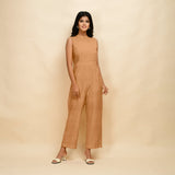 Front View of a Model wearing Desert Yellow 100% Linen Princess Line Sleeveless Jumpsuit