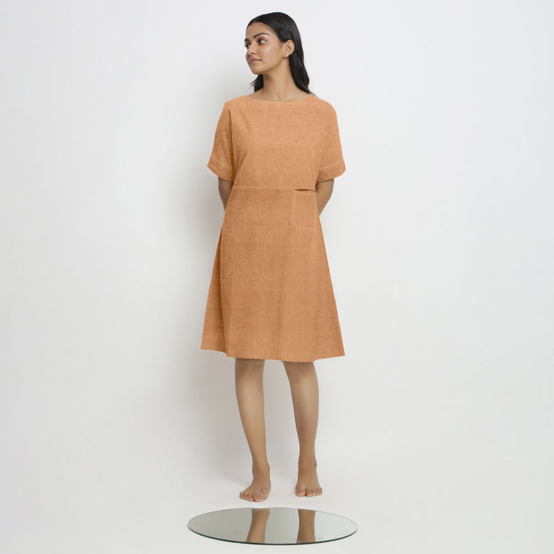 Front View of a Model wearing Desert Yellow Linen Knee Length Yoked Dress