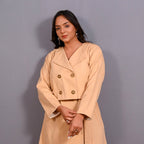Front Detail of a Model wearing Dusk Beige Warm Cotton Flannel Double-Breasted Button-Down Shacket