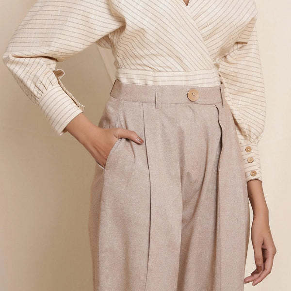 Front Detail of a Model wearing Dusk Brown Box Pleated Pegged Pant