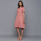 Left View of a Model wearing English Rose Paneled Cotton Flannel Dress