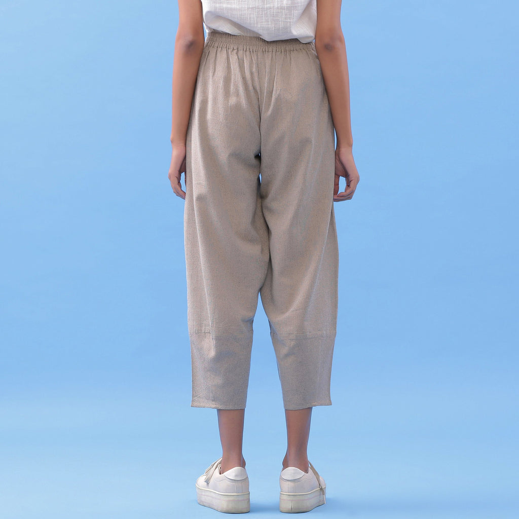 Back View of a Model wearing Essential Beige Cotton Paneled Pant