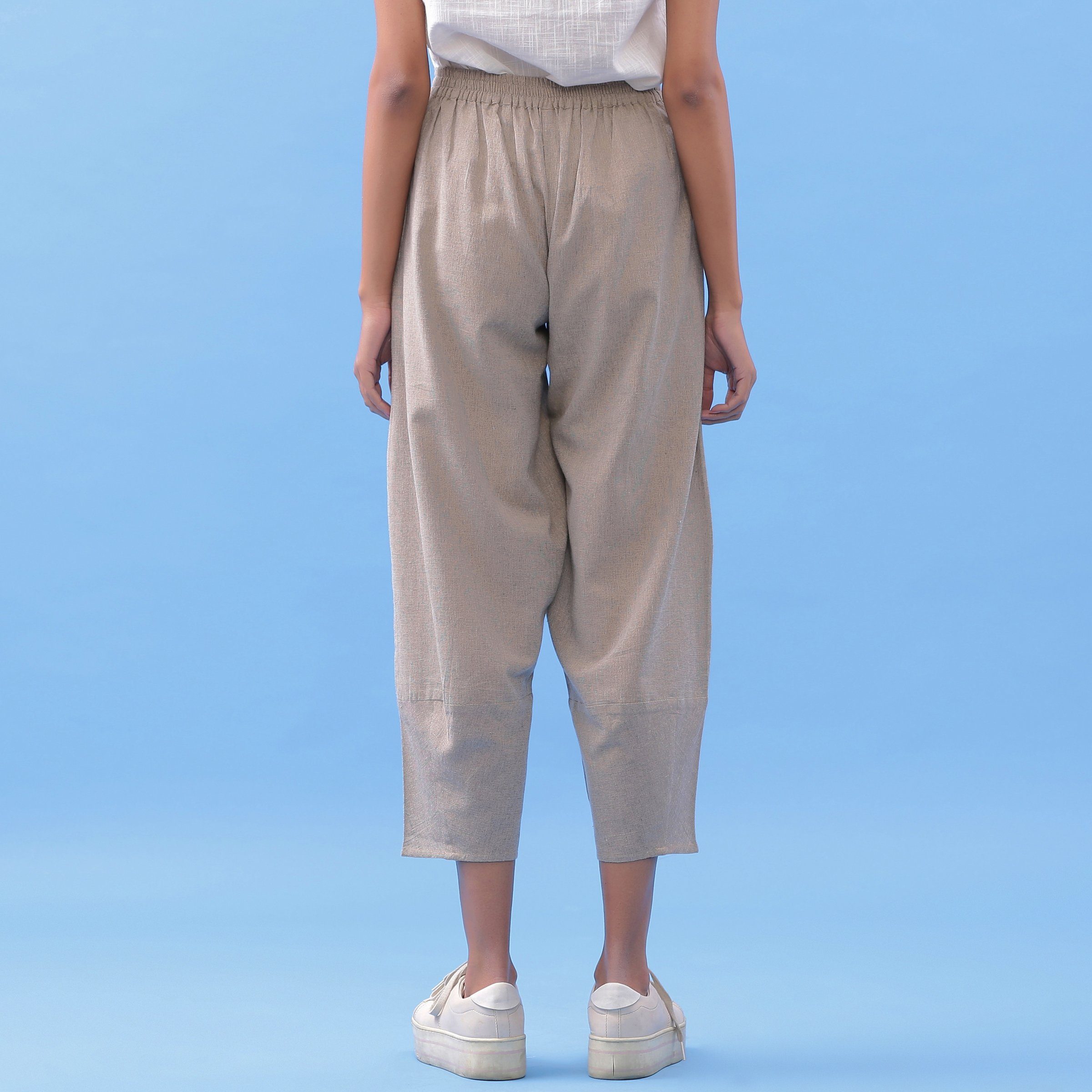 Back View of a Model wearing Essential Beige Cotton Paneled Pant
