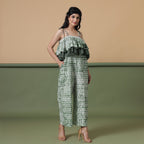 Right View of a Model wearing Forest Green Tie-Dye Ankle Length Cotton Camisole Jumpsuit