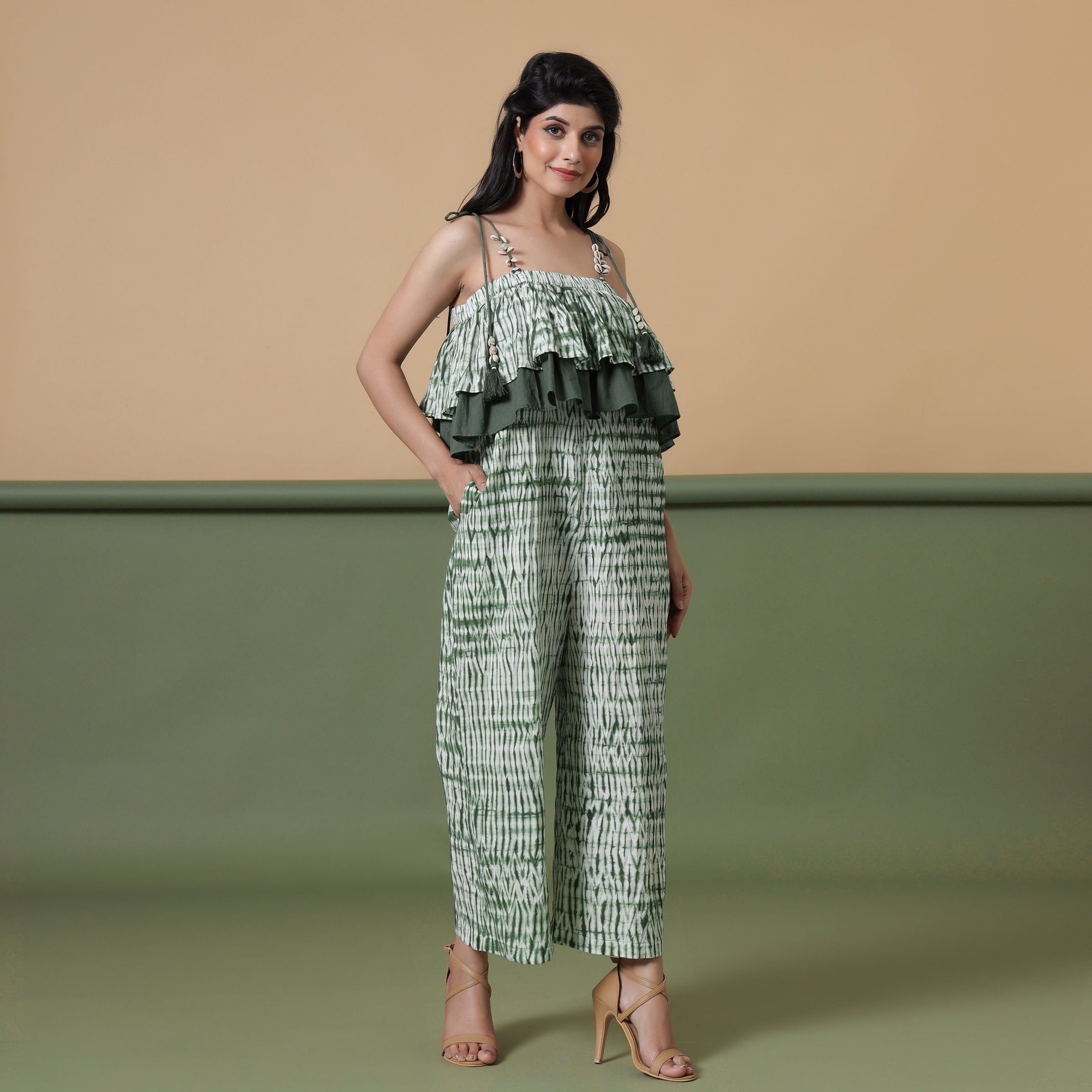 Right View of a Model wearing Forest Green Tie-Dye Ankle Length Cotton Camisole Jumpsuit