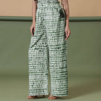 Left View of a Model wearing Forest Green Tie Dye Cotton Paperbag Pant