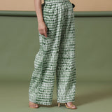 Right View of a Model wearing Forest Green Tie Dye Cotton Paperbag Pant