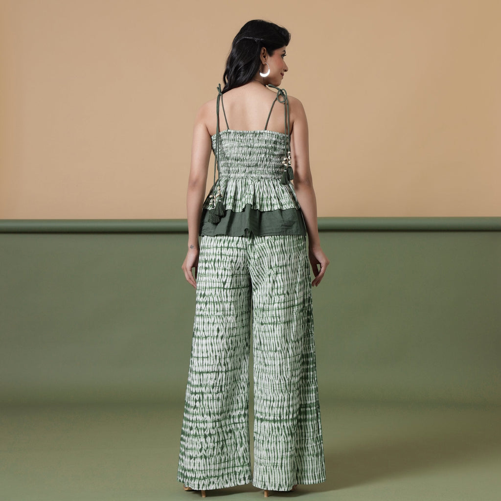 Back View of a Model wearing Forest Green Tie-Dye Cotton Camisole Tier Top