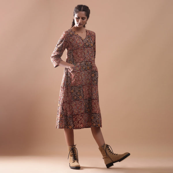 Right View of a Model wearing Warm Block Printed Muddy Red Cotton Midi Dress